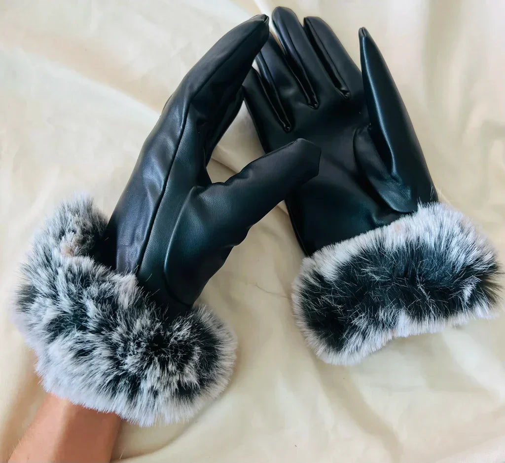 Comfortable women's winter gloves: sleek PU leather and cozy faux fur trim for ultimate warmth and style.