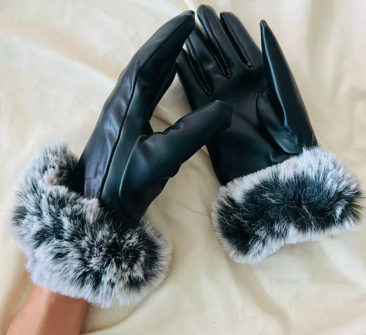 Comfortable women's winter gloves: sleek PU leather and cozy faux fur trim for ultimate warmth and style.