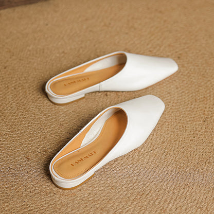 Women's fashionable square-toe mules with a contemporary block heel and versatile appeal.
