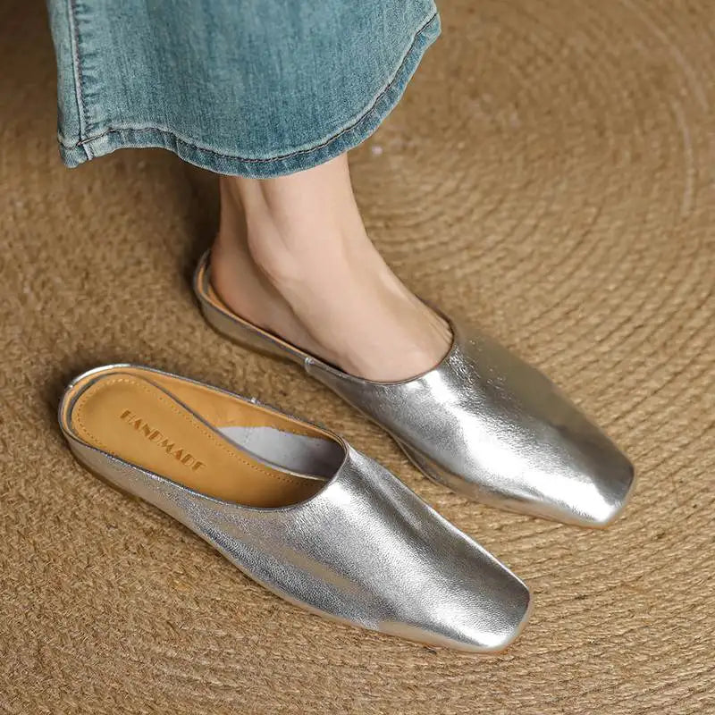 Trendy women's square-toe mules with a sturdy block heel, offering both style and ease.