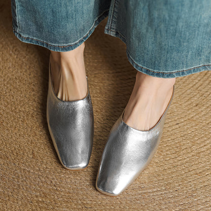 Black square-toe block heel mules for women, designed for comfort and modern casual chic.