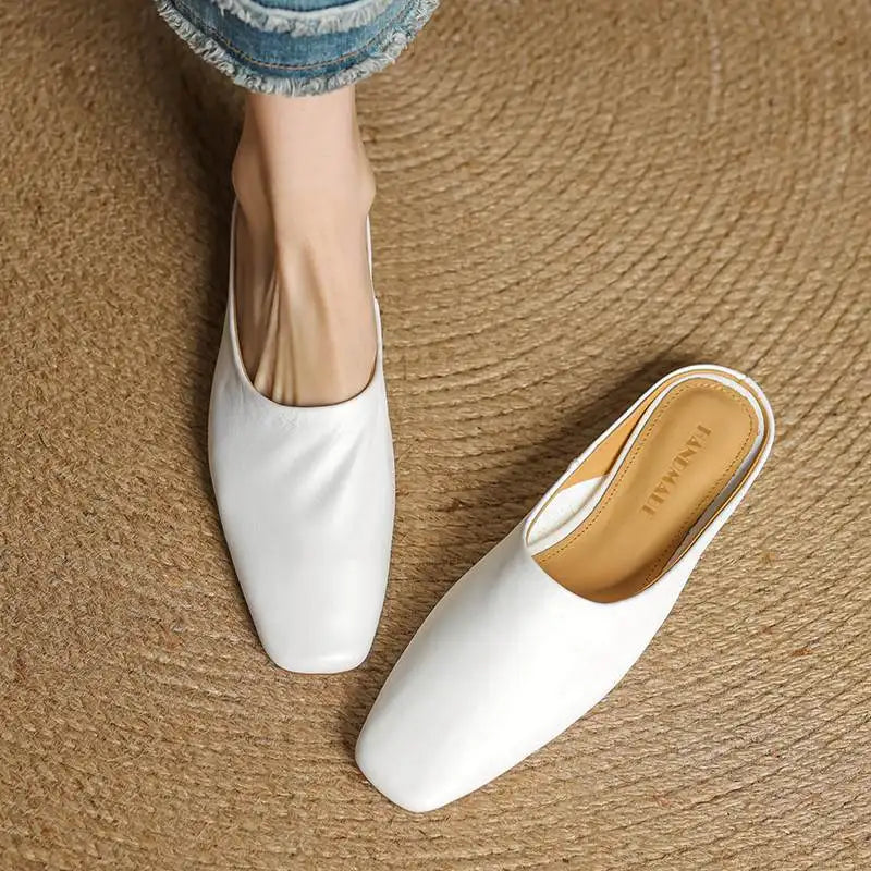 Easy slip-on square-toe mules for women, featuring a comfortable block heel and elegant design.