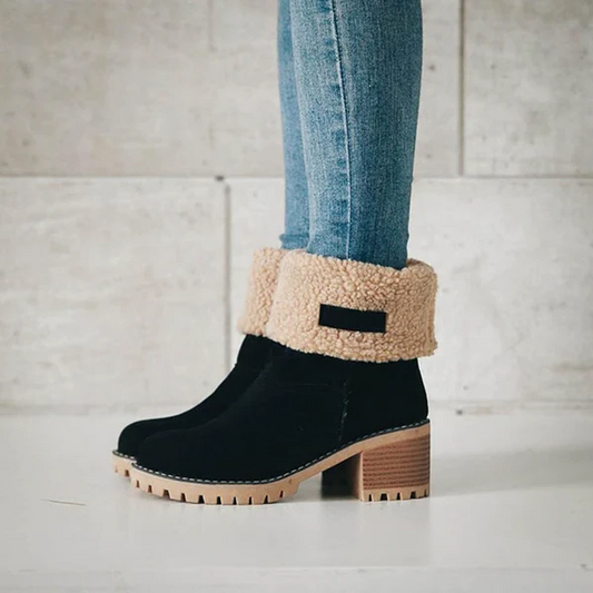 Women's stylish block heel snow boots, perfect for warm winter comfort & cold weather adventures.