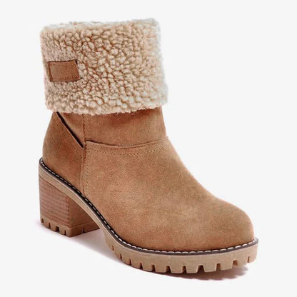 Chic women's block heel snow boots with a sturdy design, ideal for stylish cold weather fashion & warmth.
