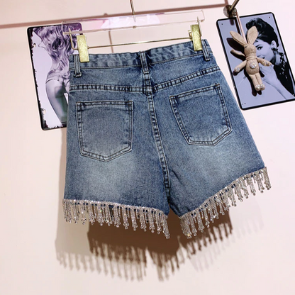 Casual women's blue denim shorts, offering ultimate comfort for summer outings and versatile everyday wear.