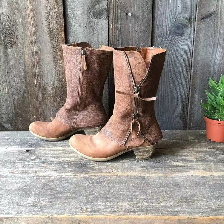 Brown western-style ankle boots for women, stylish and comfortable fall footwear perfect for everyday outfits.