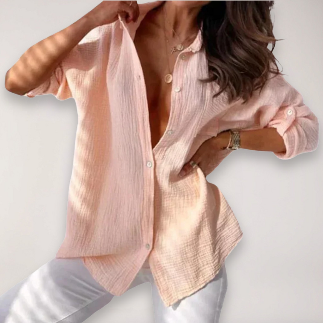 Women's stylish button-front blouse, perfect for versatile casual and office wear. Lightweight everyday top.