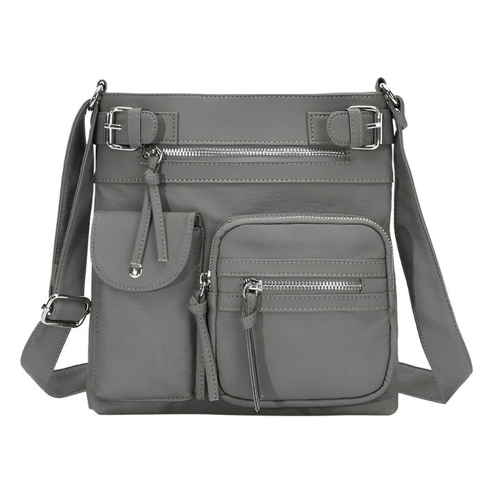 Fashionable red women's crossbody bag, a versatile handbag with multiple pockets for daily essentials.