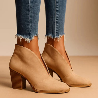 Chic slip-on ankle boots for women, comfort & style for winter footwear.