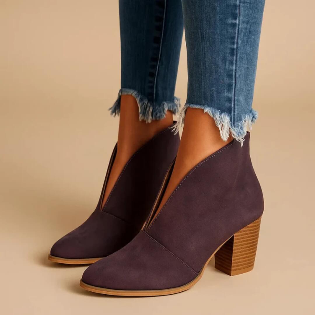 Stylish women's black ankle boots, comfortable & chic for fall/winter.