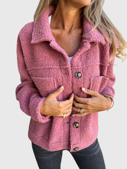 Stylish women's fall jacket featuring prominent pockets and classic button front for a modern look.