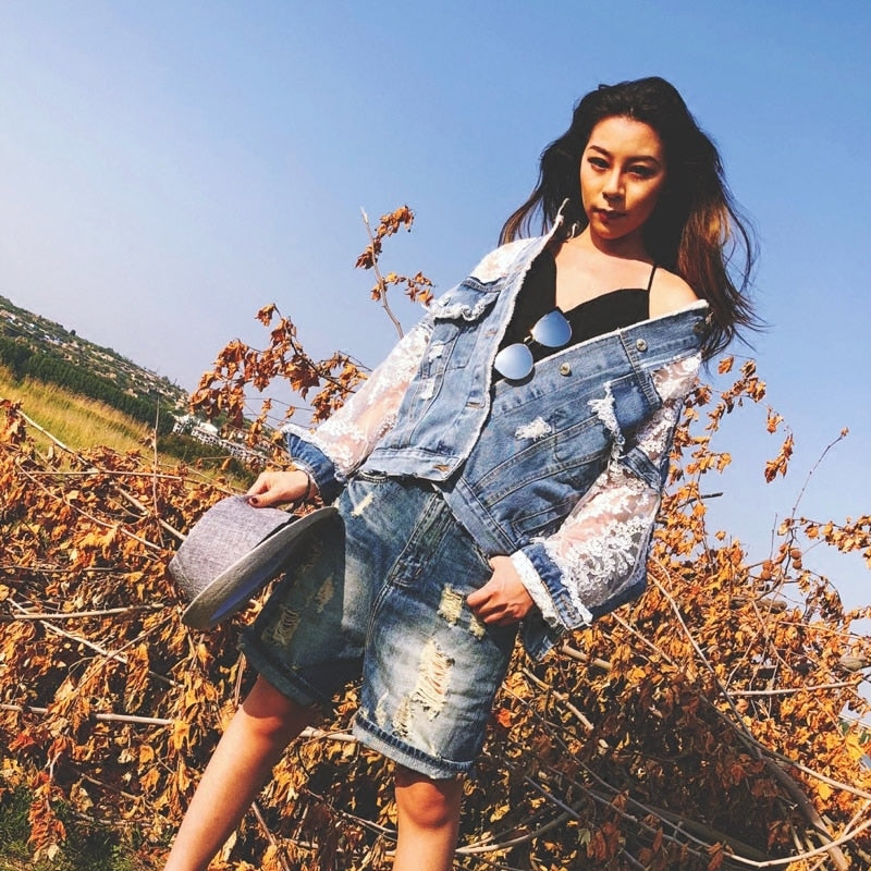 Stylish women's frayed edge denim jacket for casual outfits, ideal for layering and street fashion.