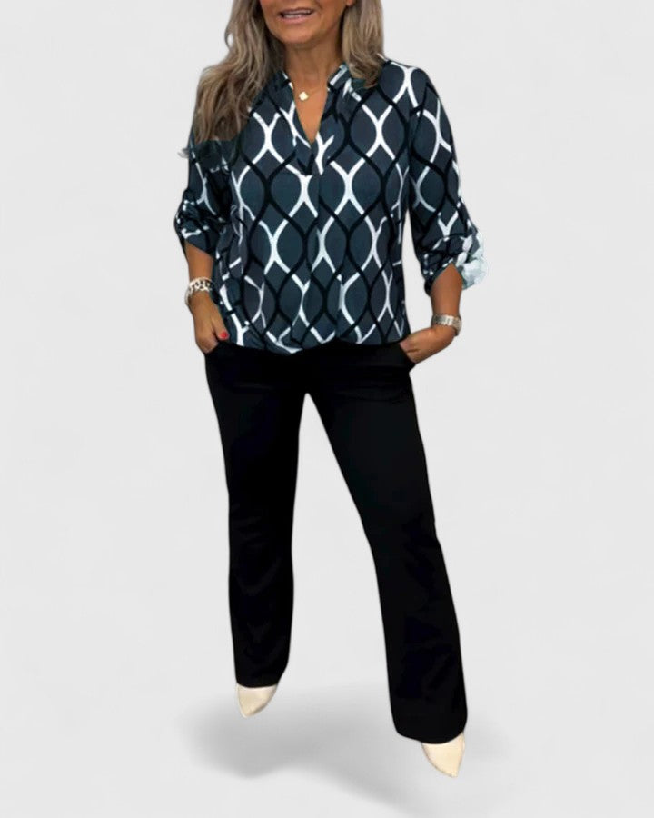 Women's stylish graphic print blouse, three-quarter sleeve, loose fit for casual comfort.