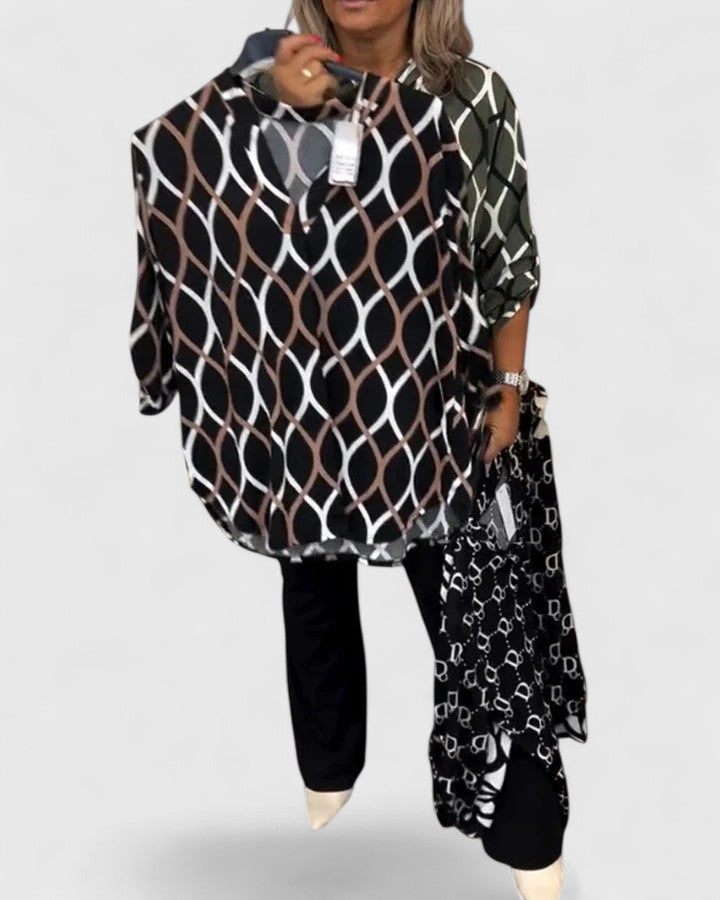 Comfortable women's three-quarter sleeve blouse with a stylish graphic print and loose, casual fit.