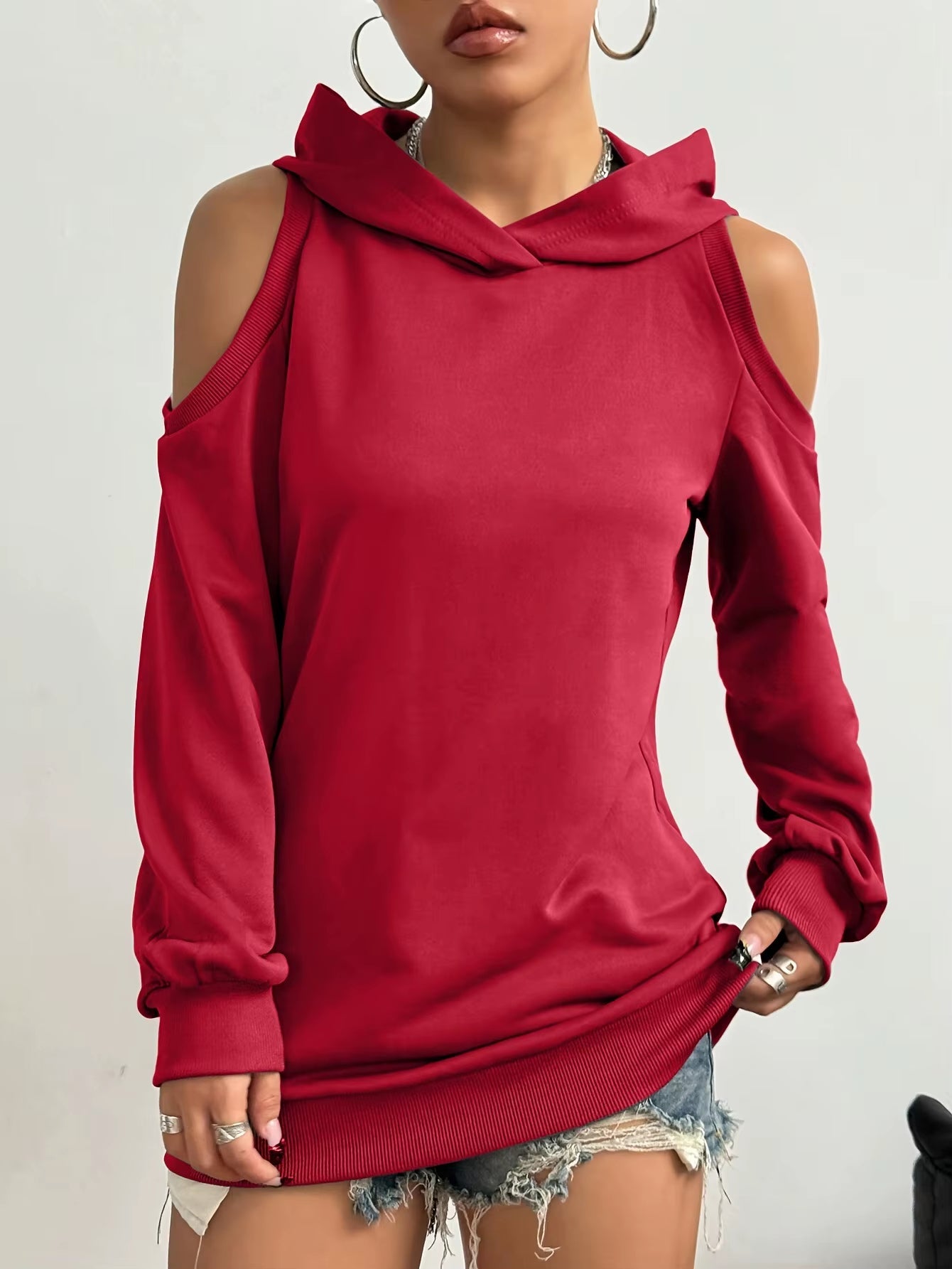 Effortless gray women's off-shoulder hoodie, offering comfort & a chic relaxed fit for casual style.