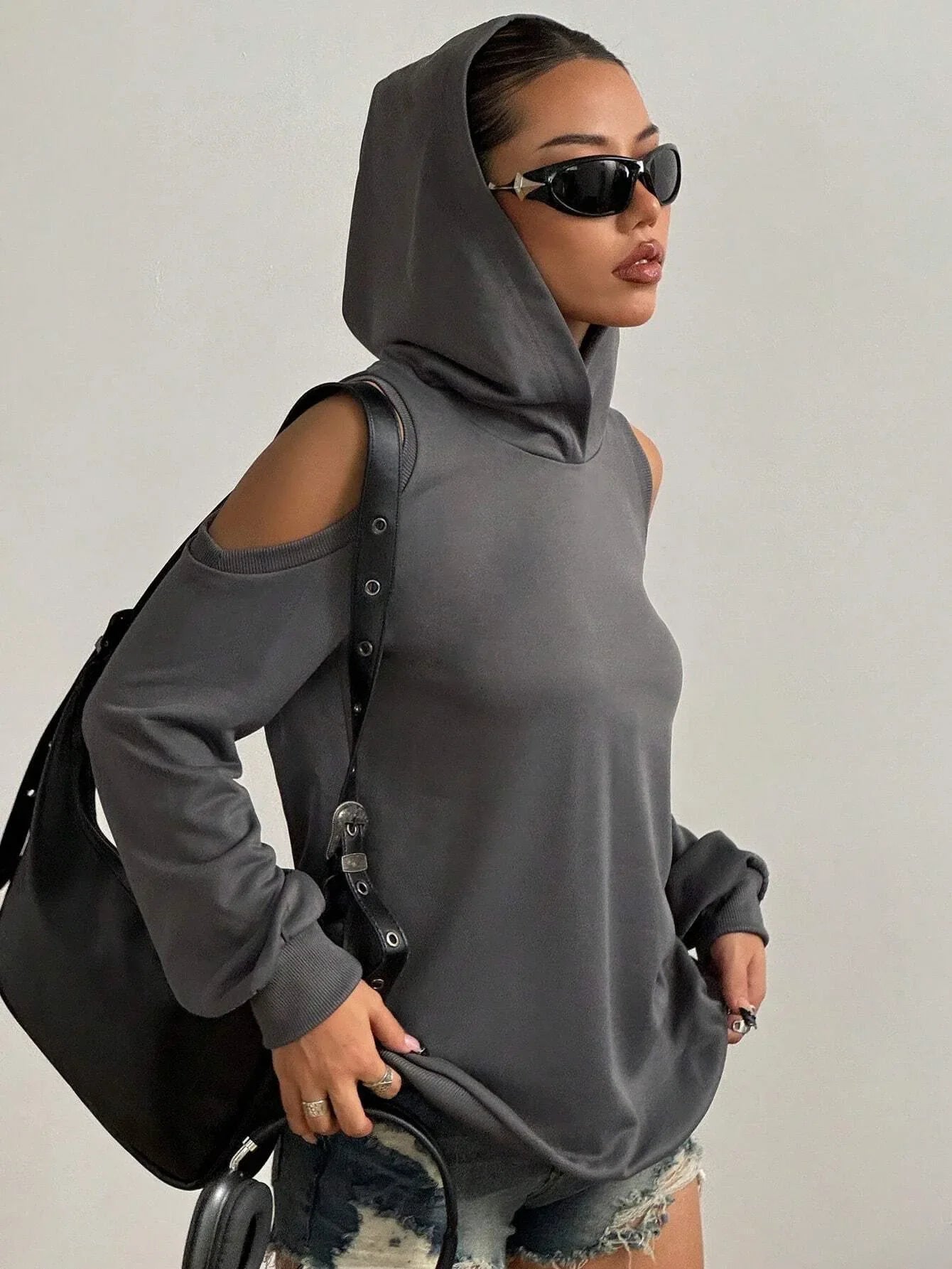 Chic gray off-shoulder cutout hoodie for women, offering a stylish & comfortable relaxed fit.