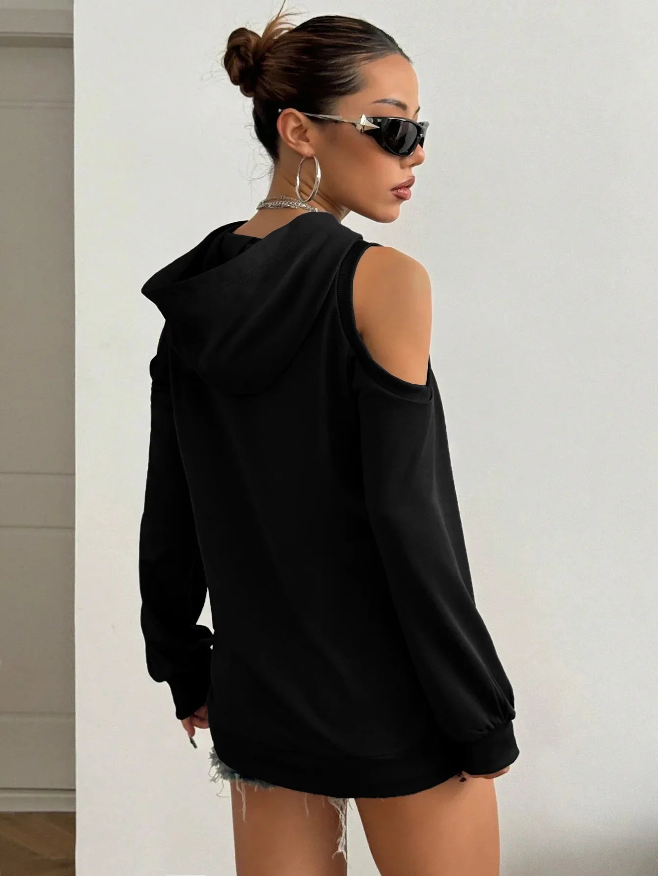 Comfortable red women's off-shoulder top, a stylish hoodie perfect for casual everyday wear.