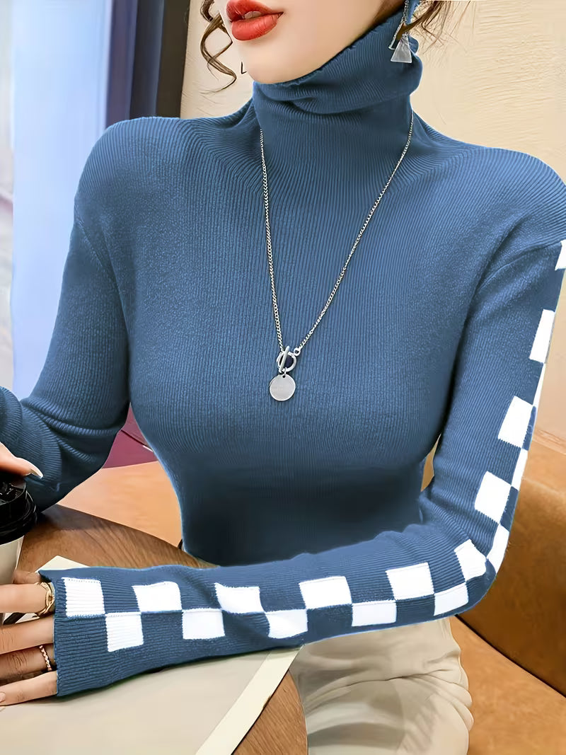 Elegant women's turtleneck sweater featuring unique check pattern sleeves. Stylish winter casual wear.