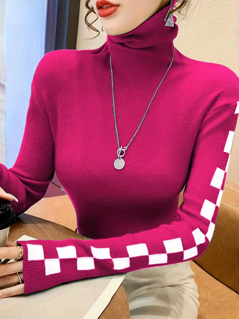 Warm women's turtleneck sweater with stylish check sleeves, a must-have for cold weather fashion.