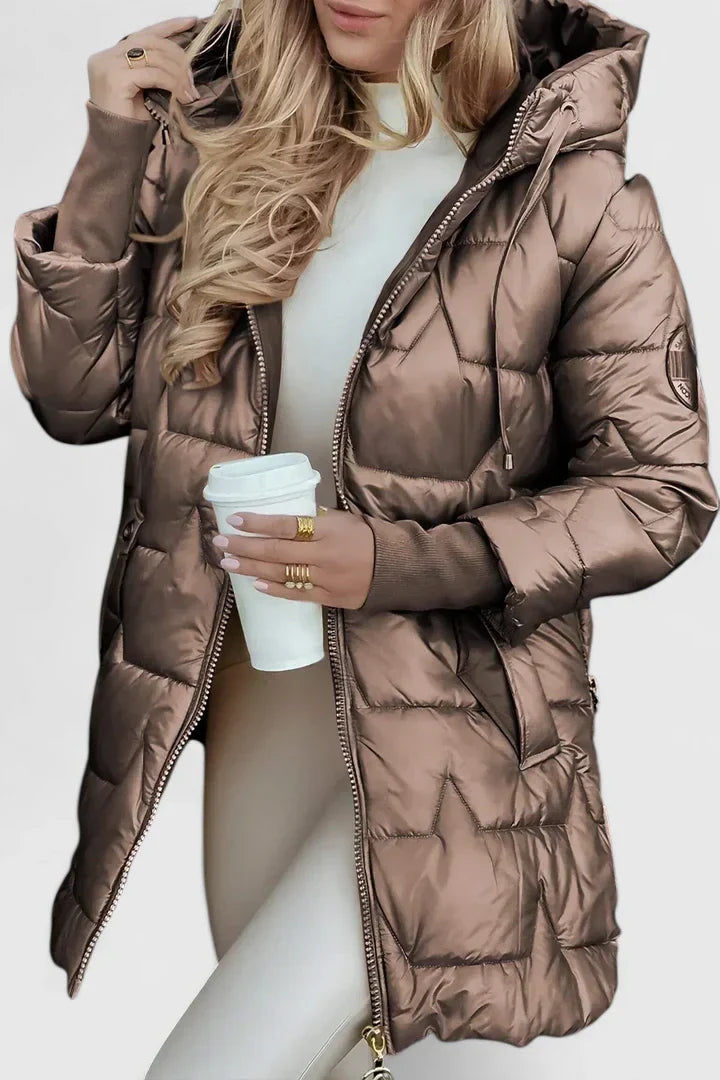 Soft women's warm hooded winter coat. Elegant long outerwear, ideal for chilly fall days, offering comfort & style.