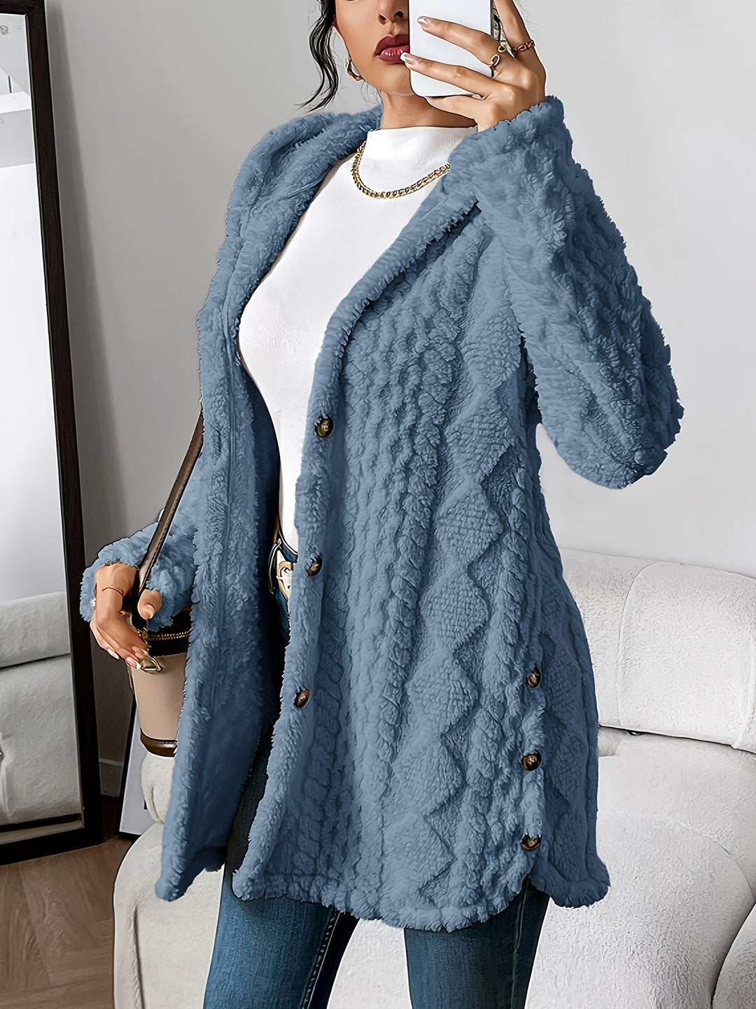 Casual yet chic women's fall/winter long coat, hooded design & button accents.