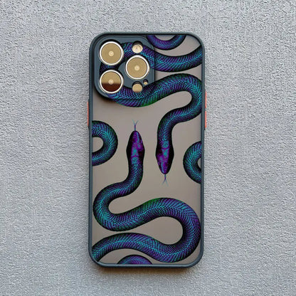 Women's luxury phone accessory: stylish iPhone case with an intricate serpent motif pattern. Slim & protective.