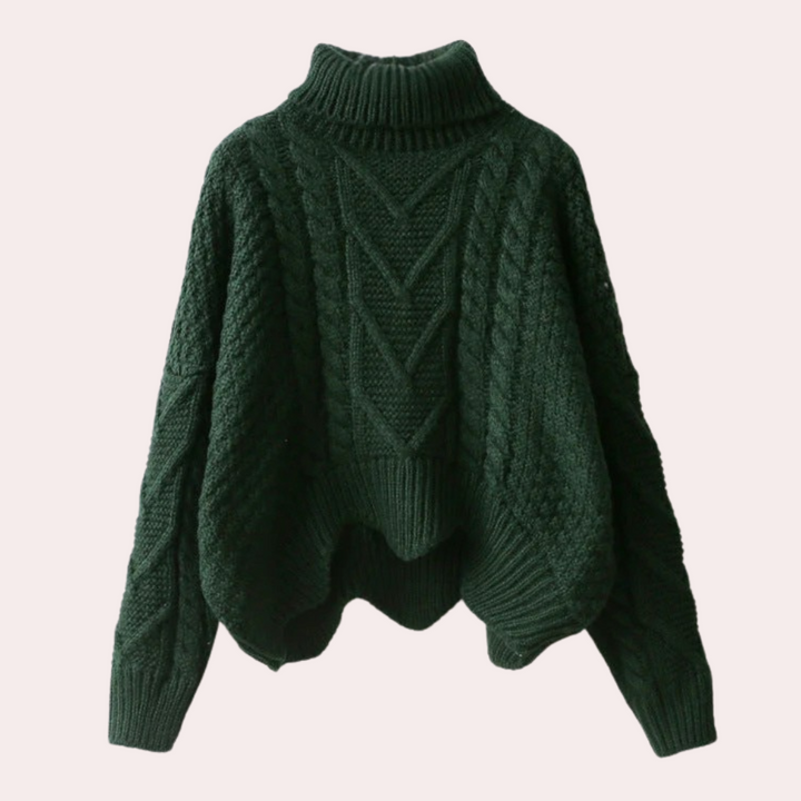 Cozy women's knitted turtleneck sweater, a stylish long sleeve top for winter fashion.