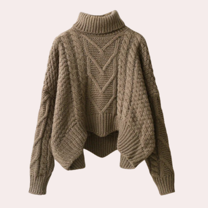 Fashionable women's long sleeve knitted turtleneck sweater, comfortable for winter outfits.