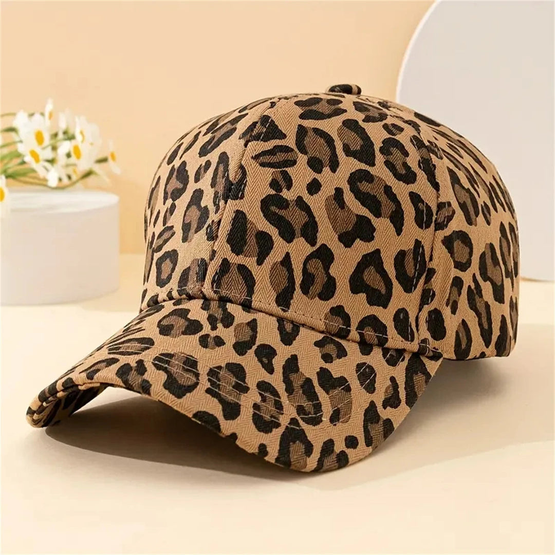 Women's stylish leopard print adjustable baseball cap for sun protection. Fashion accessory.