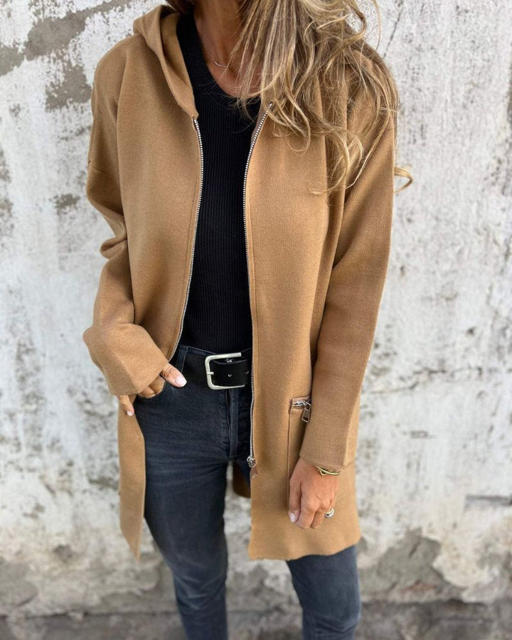 Stylish women's long sleeve cardigan featuring a practical full zipper and round neck.