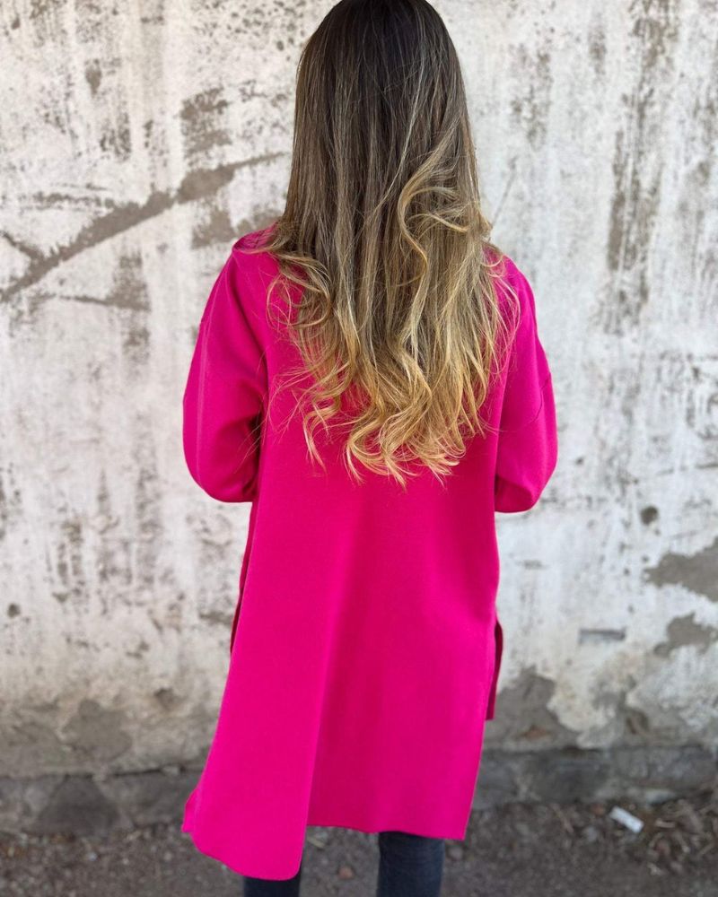 Stylish women's long sleeve cardigan, zipped front, round neck, versatile for elegant or casual looks.