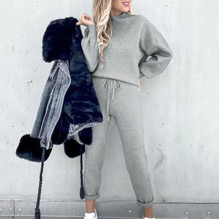 Versatile women's two-piece mock neck set with drawstring pants, ideal for lounging or casual outings.