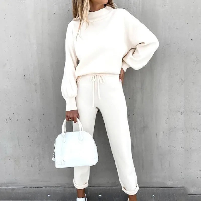 Soft women's mock neck 2-piece lounge set with comfy drawstring pants & stylish balloon sleeves.