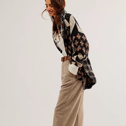 Oversized women's knit cardigan with a modern geometric pattern, perfect for casual warmth.