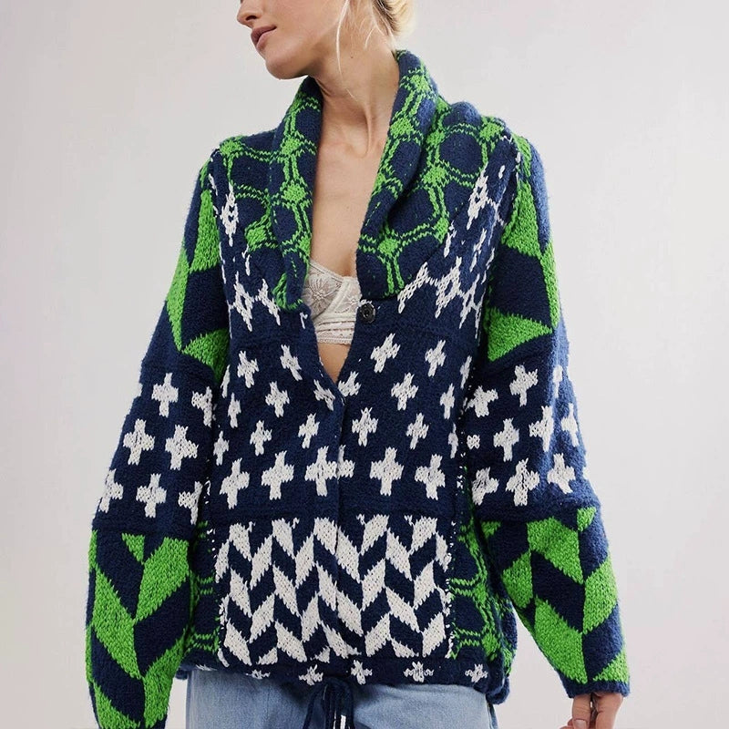 Textured women's oversized knitted long sleeve cardigan, offering cozy warmth & stylish design.