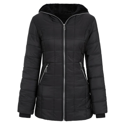 Woman wearing a chic padded winter coat, ideal for staying warm and fashionable in cold weather.