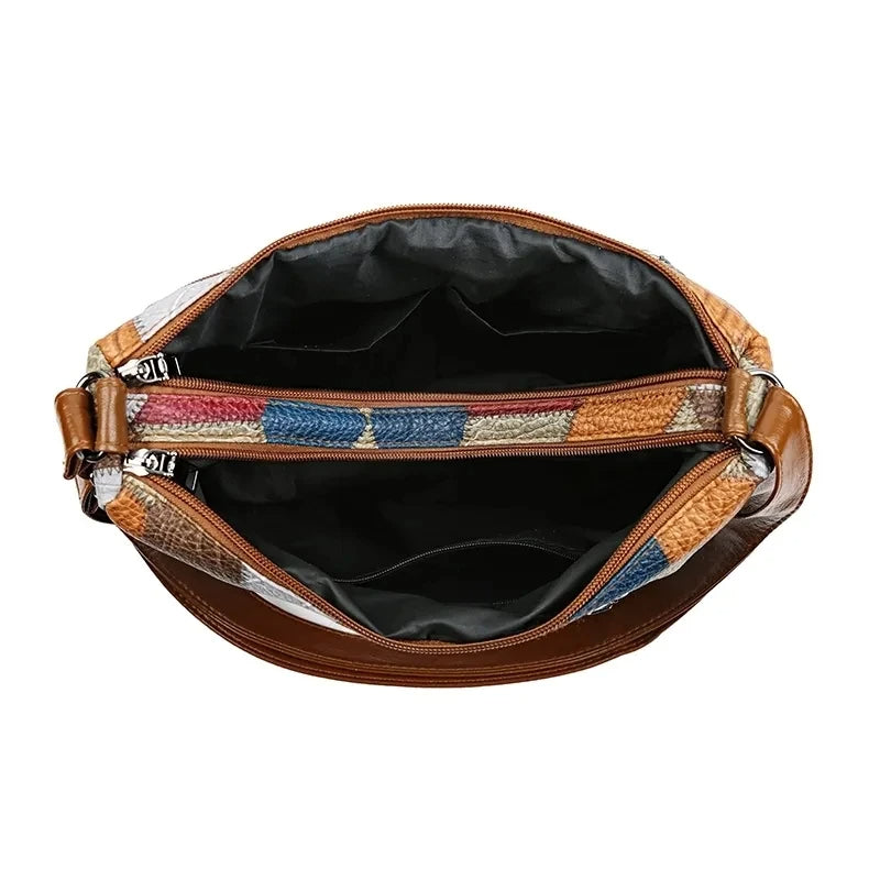Women's patchwork shoulder/crossbody bag featuring adjustable strap for versatile, comfortable carrying.
