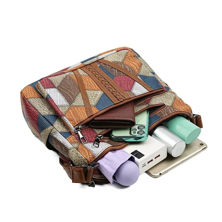 Fashionable women's patchwork handbag styled with casual outfit, perfect urban exploration accessory.