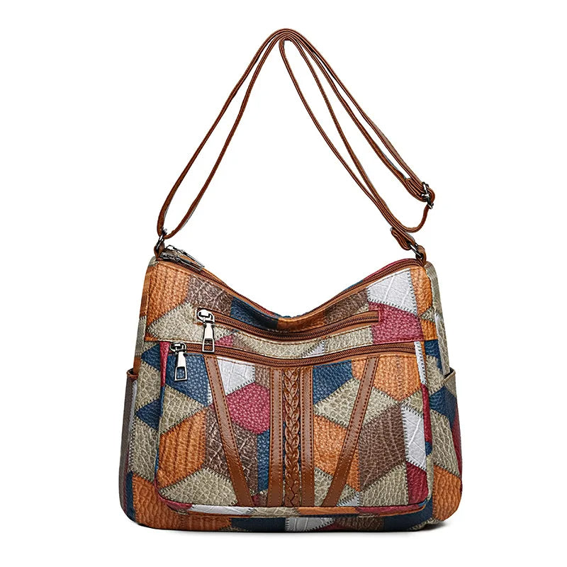 Close-up of rich texture on women's patchwork vegan leather handbag, highlighting artisanal craftsmanship.