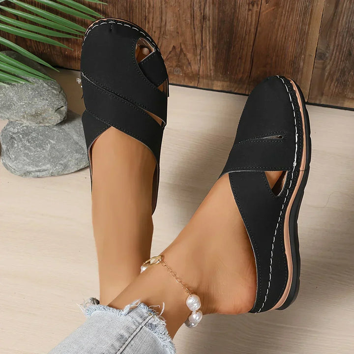 Comfortable women's platform wedge sandals with elevated support, chic for casual summer style.