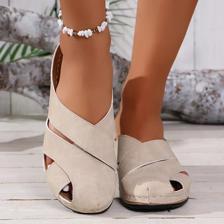 Chic women's platform wedge sandals, providing stylish elevation & all-day comfort for summer.