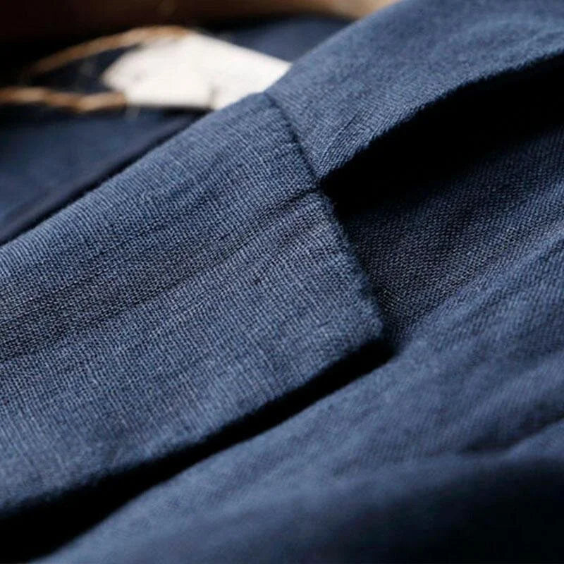 Back view of a women's stylish relaxed fit blazer. Comfortable, sophisticated, and perfect for versatile summer fashion.
