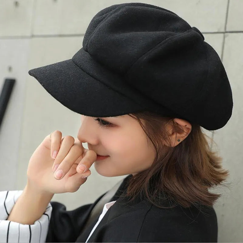 Women's stylish retro balloon hat. Warm cotton winter cap, a fashionable vintage headwear accessory.