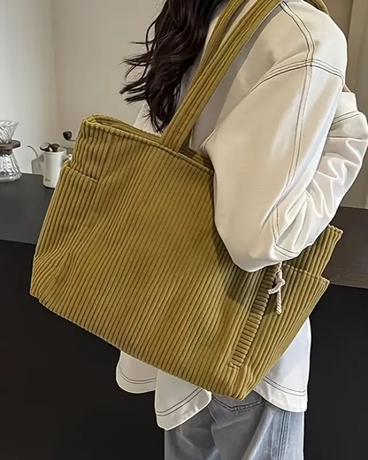 Chic ribbed tote bag for women, stylish and spacious, designed for modern everyday fashion.