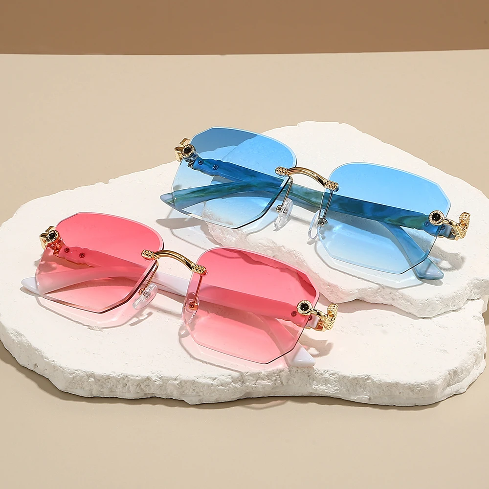 Sleek women's rimless gradient sunglasses, combining stylish design with vital UV protection eyewear.