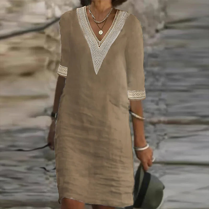 Elegant women's summer dress, a versatile midi with short sleeves for both casual outings and chic spring occasions.