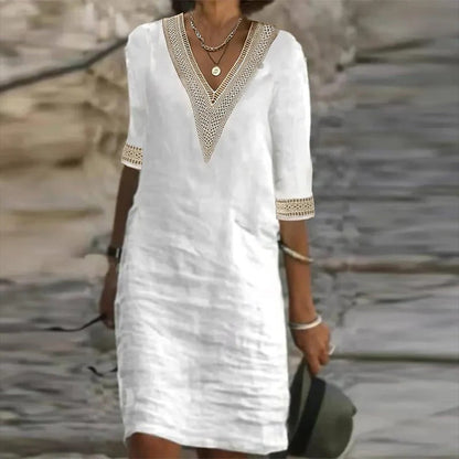 Stylish women's short sleeve midi dress, a comfortable and flowy summer dress for effortless elegance and spring fashion.