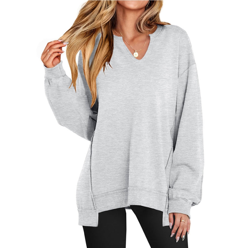 Relaxed fit women's v-neck sweatshirt tunic. Cozy long-sleeve top perfect for comfortable casual wear & everyday style.