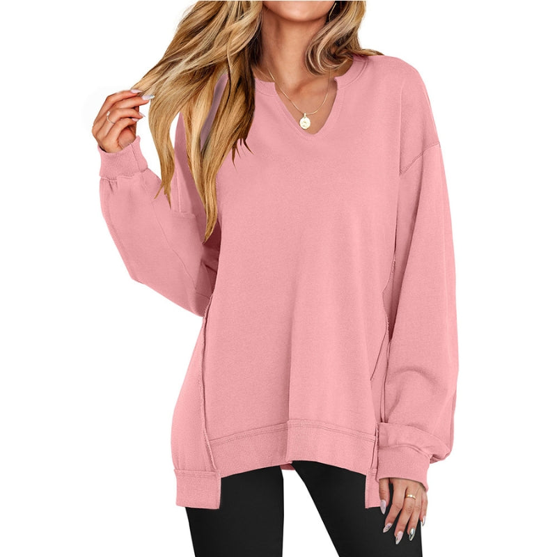 Stylish women's v-neck tunic sweatshirt. Versatile long-sleeve top, ideal for comfortable casual wear & everyday fashion.