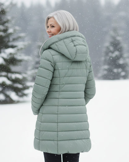 Warm women's winter coat, stylish long sleeve outerwear designed for ultimate comfort in cold weather.